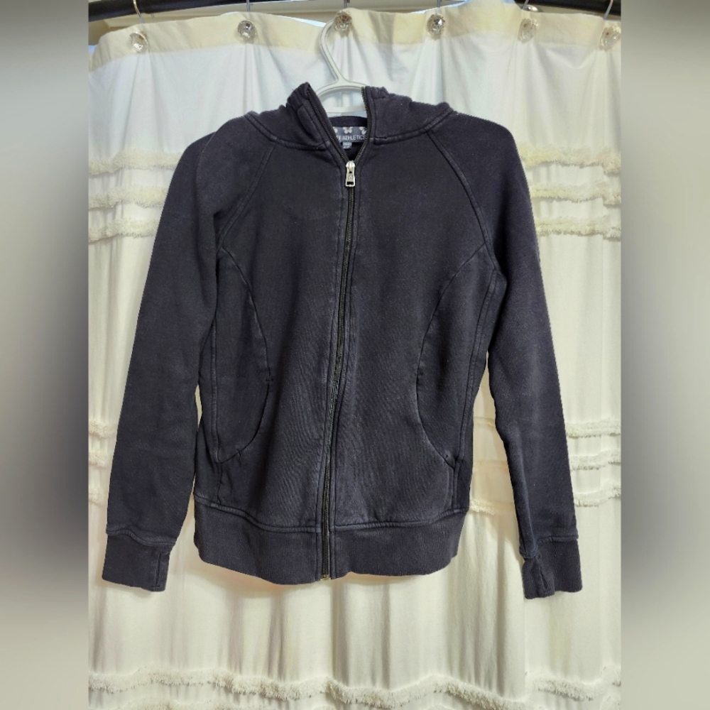 Great condition Black zip up with pockets and hood.Size small